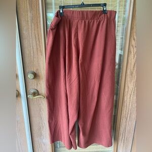 Torrid high rise wide leg pants.